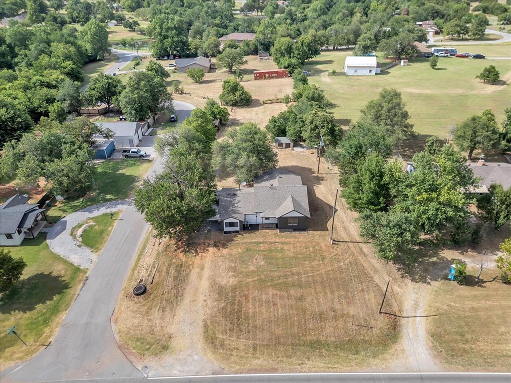 Tessa Hood Realtor – Aerial view of 0.92 acre corner lot with mature trees in Mustang, Oklahoma