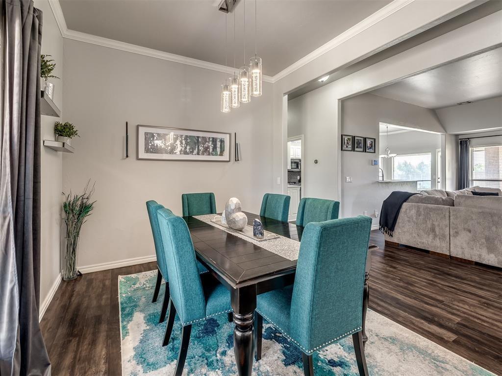 Tessa Hood Realtor – Open dining area flowing into living room at 6910 Rolling Meadows Dr, Tuttle Oklahoma