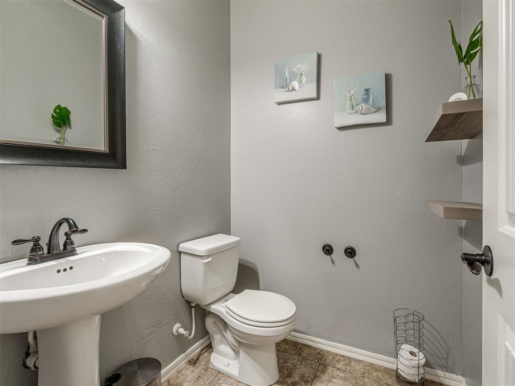 Tessa Hood Realtor – Half bath powder room with pedestal sink at 5708 SE 148th St, Oklahoma City OK
