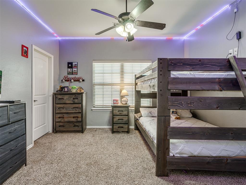 Tessa Hood Realtor – Secondary bedroom with bunk beds and LED accent lighting at 5708 SE 148th St, Oklahoma City OK