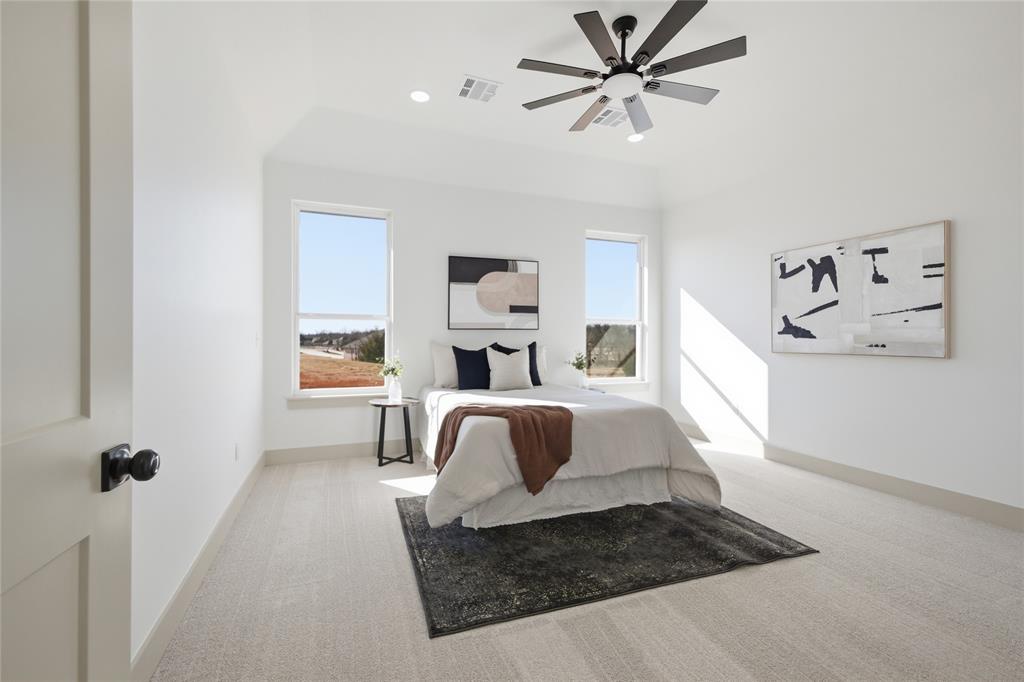 Tessa Hood Realtor – Spacious primary bedroom with vaulted ceiling at 2439 Wind River Cir, Blanchard Oklahoma